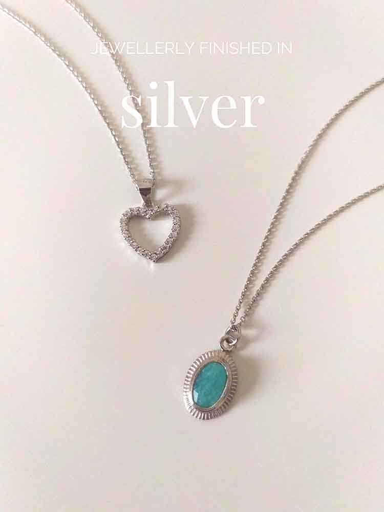 Heart pendant necklace. Silver jewelery.